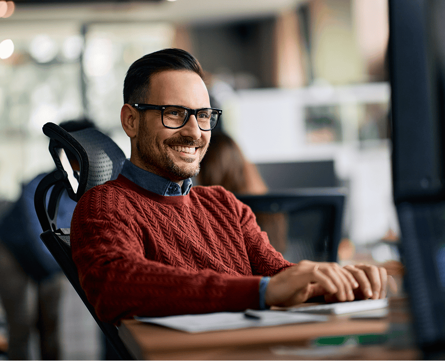 Person sitting at a desk, working.